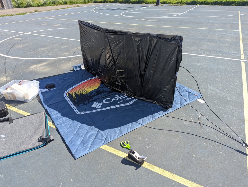Back of panel with garbage bag blocking bifacial side