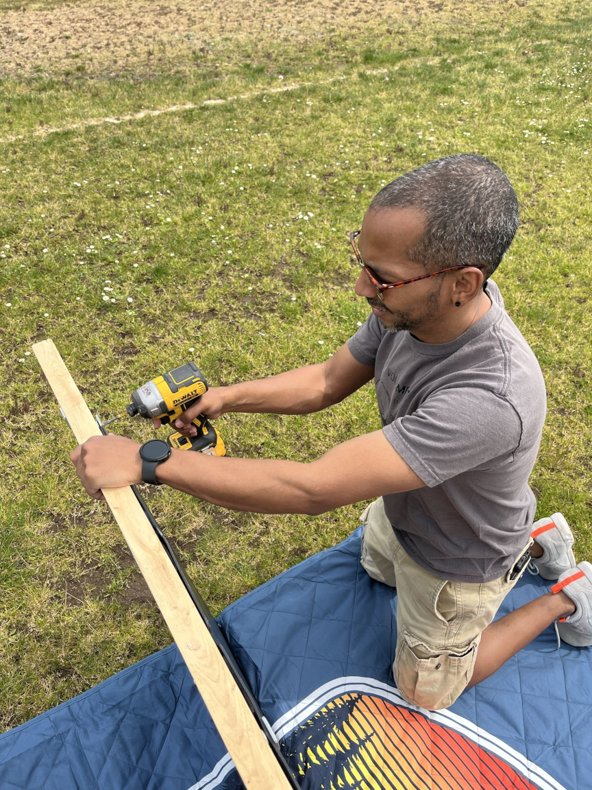 Jose building the wooden frame, May 9